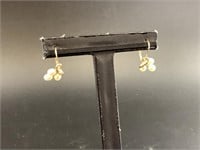 Pair of 14kt gold and pearl earrings, total weight