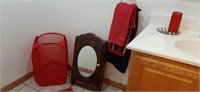 Decorative contents of bathroom.  Red,white,