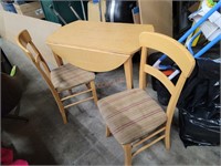 Vintage drop leaf dining table with two chairs
