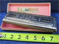 large old "echo harp" harmonica in case