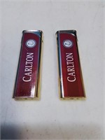 Pair of Carlton advertising cigarette lighters