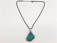 Sterling silver and turquoise pendant on a 24" cha