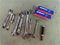BAG OF WRENCHES & 2 A/C DLECO SPARKPLUGS