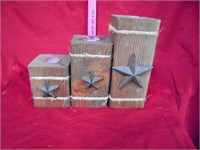 Set of 3 wooden candle holders with star