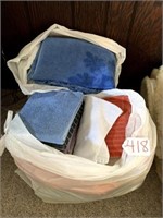 2 WHITE BAGS OF TOWELS