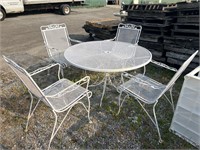 Metal patio dining set:  48” table and 4 arm