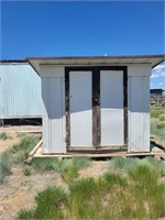 Metal Storage Shed and wooden skid