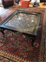 Leased glass top coffee table with Queen Anne legs