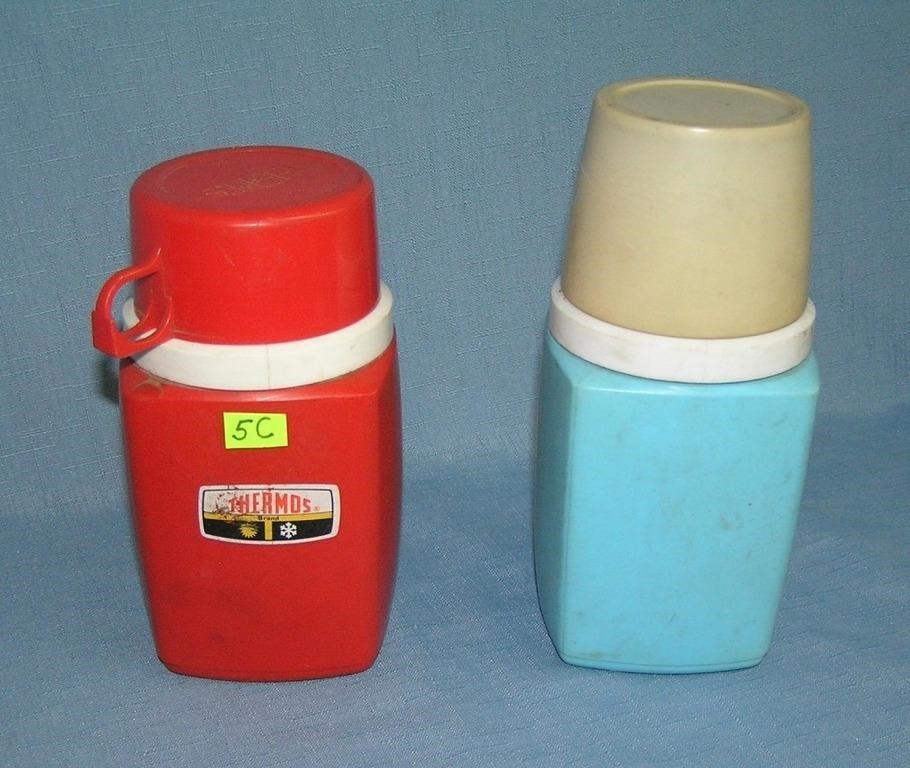 Pair of vintage Thermos bottles