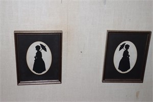 2 Silhouette pictures of a woman with umbrella 7