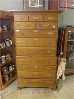 Oak 12 drawer high boy chest with brass hardware