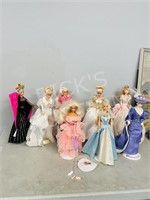 8 assorted Barbie dolls