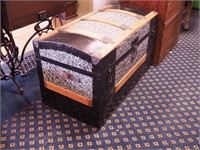 Wood and tin trunk with slightly curved top,