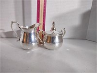 Sterling silver creamer and sugar bowl with lid,