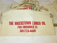 Pile of Hagerstown Lumber Nail Pouches
