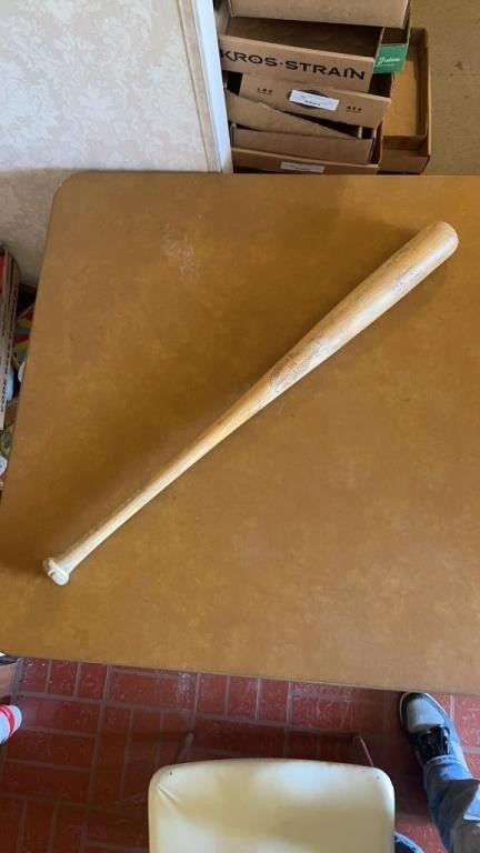 Genuine Louisville slugger baseball bat.