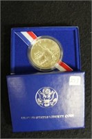 1986 Liberty Silver Dollar with box and COA