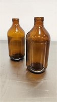 2 PALLETS APPROX. 22 BOXES AMBER GLASS BOTTLES