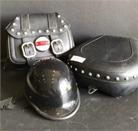 Lot of various motorcycle parts. Black Motorcycle
