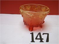 AMBERINA CARNIVAL GLASS FOOTED CANDY BOWL
