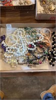 Box of vintage necklaces and bracelets