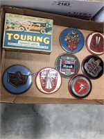 Round emblems, Touring card game