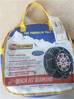 Set of Unused Les Schwab Quick Fit Diamond Tire
