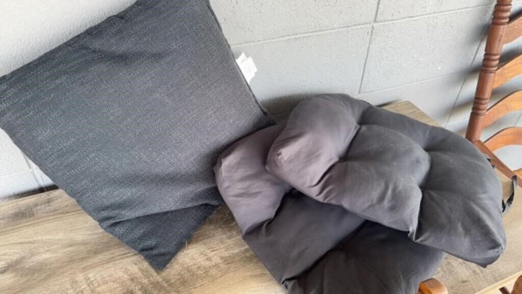 Black pillow and cushions