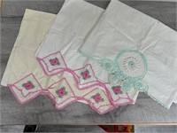 3 hand crocheted and embroidered pillow cases