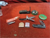 Leatherman tool, tape measures, knife, misc.