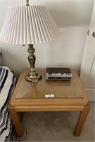 End table, brass lamp, clock radio