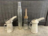Oil bottles & cans and old wrenches- some Ford