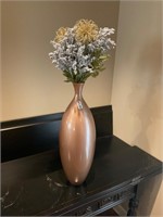 Beige vase and flowered decor