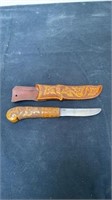 3” wooden handle knife signed and numbers with