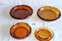 4 VINTAGE AMBER GLASS ASH TRAYS