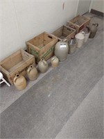 Vintage wooden boxes and clay jugs