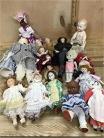 Box of 14 Porcelain dolls