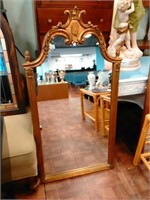 Ornate gold frame wall mirror