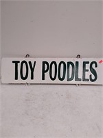 Metal toy poodles sign
