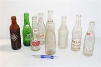 4 BOXES OF ADVERTISING GLASS BOTTLES