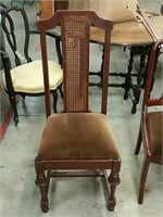 Brown caneback side chair