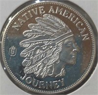 Silver dollar size native American journey coin