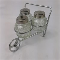 Wheelbarrow style metal condiment holder
