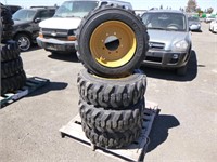 Unused 10-16.5 Skid Steer Tires/Wheels