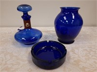 Blue glass decanter, vase, & ashtray