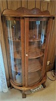 Curved front display cabinet,  approximately 60