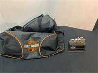 Harley Davidson, gym bag and calendar knickknack.