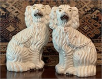 A Pair Of Antique Staffordshire Spaniels