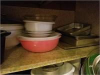 Top shelf lot of baking tins and baking dishes,