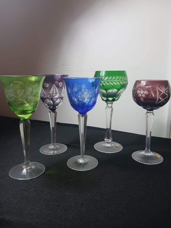 Variety of colored etched glassware